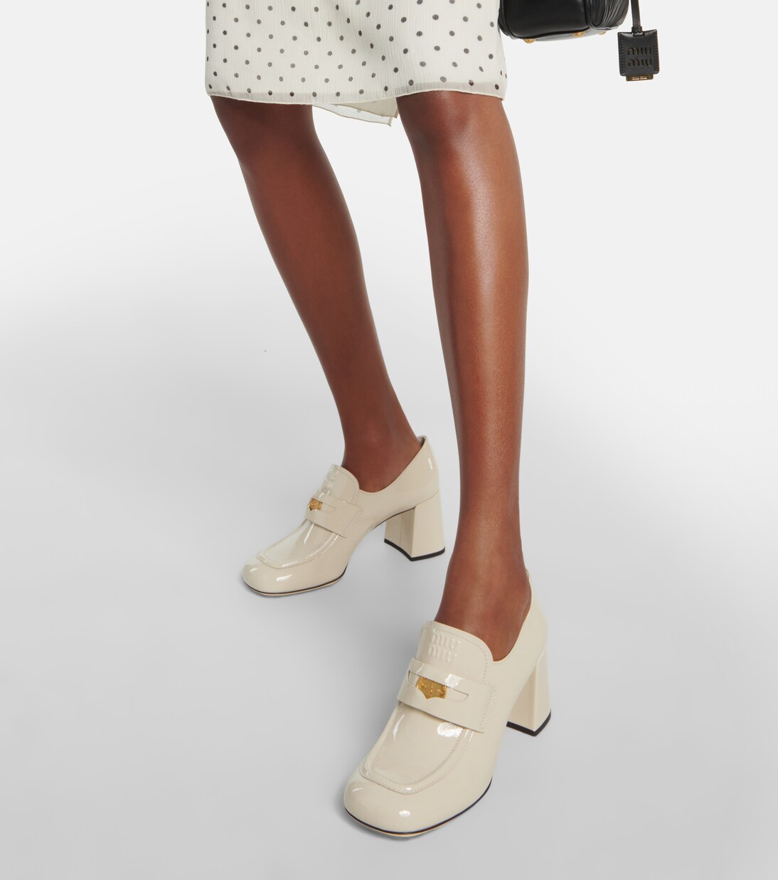 Pumps in vernice con decorazione | Miu Miu