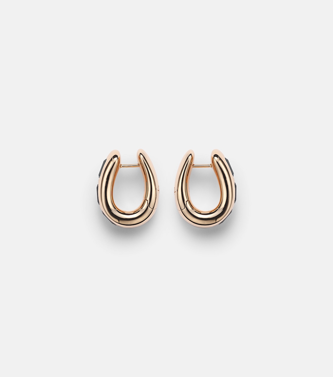 Orecchini in oro rosa 18kt Pomellato Iconica con topazio blu per uno stile giovane e raffinato