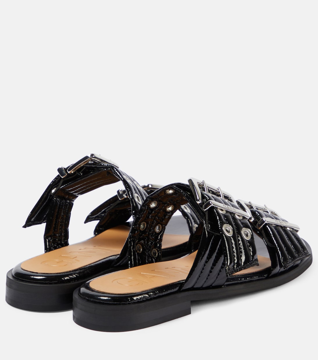 Mules en cuir verni | Ganni