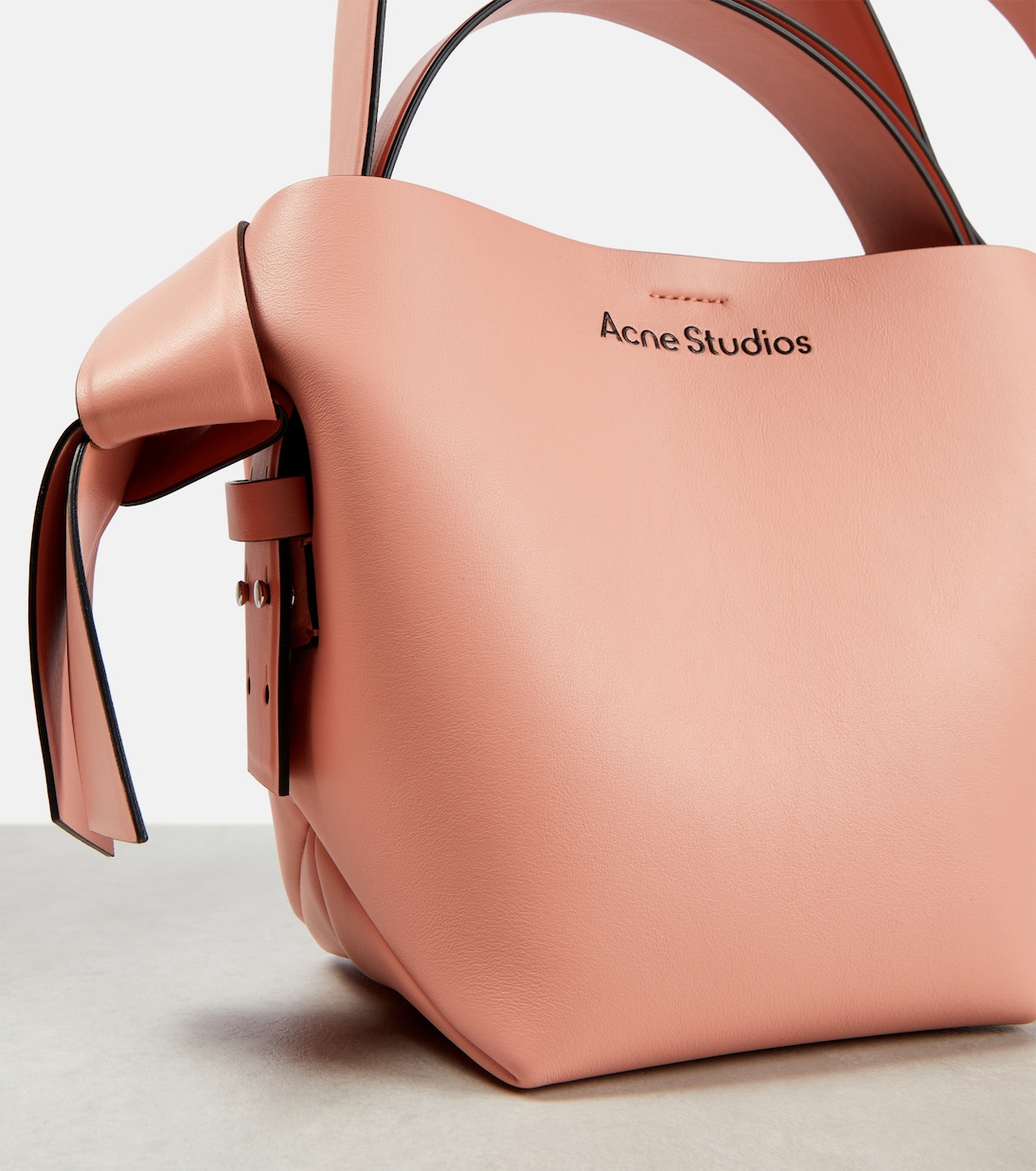 Musubi Mini leather shoulder bag in pink - Acne Studios
