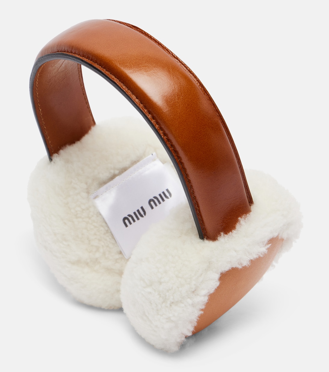Shearling-trimmed leather earmuffs | Miu Miu