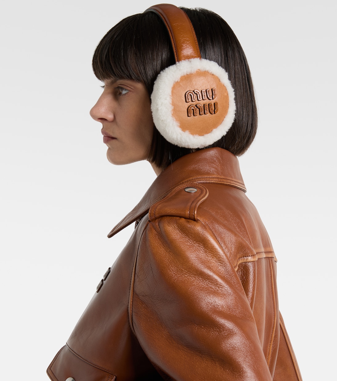 Shearling-trimmed leather earmuffs | Miu Miu