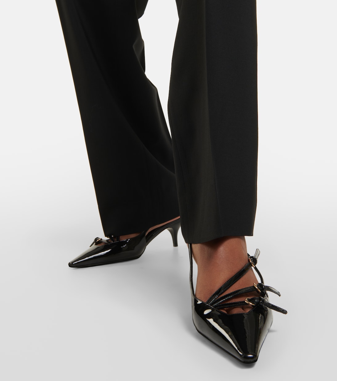 Patent leather slingback pumps in black Miu Miu Mytheresa