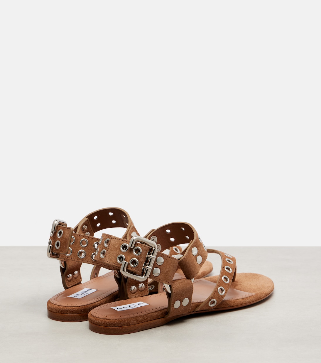 Biker studded suede thong sandals | Alaïa