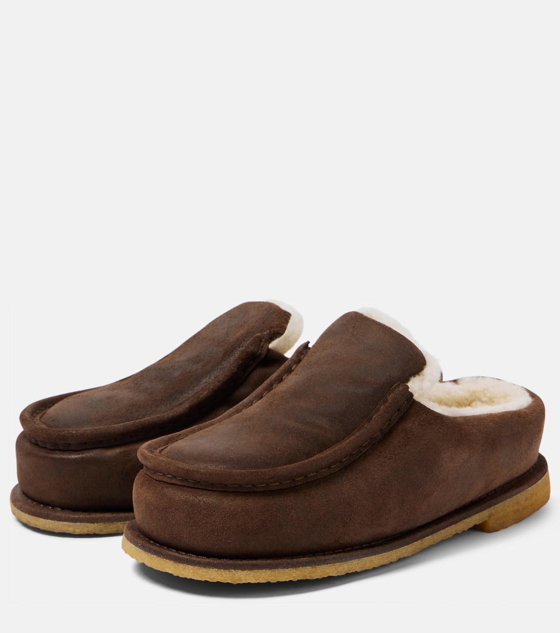 Mules en cuir et shearling | JW Anderson