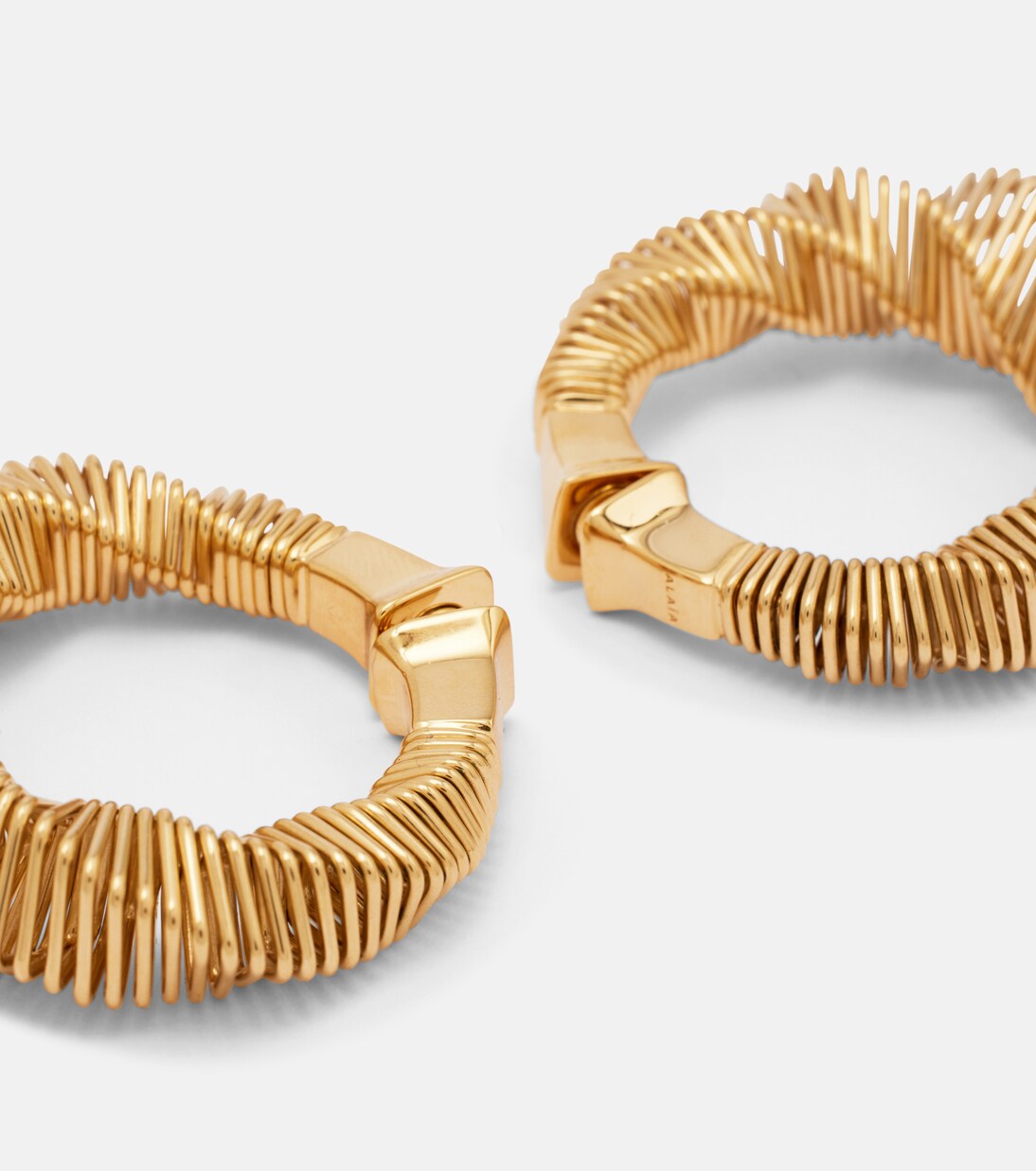Square Spiral hoop earrings | Alaïa