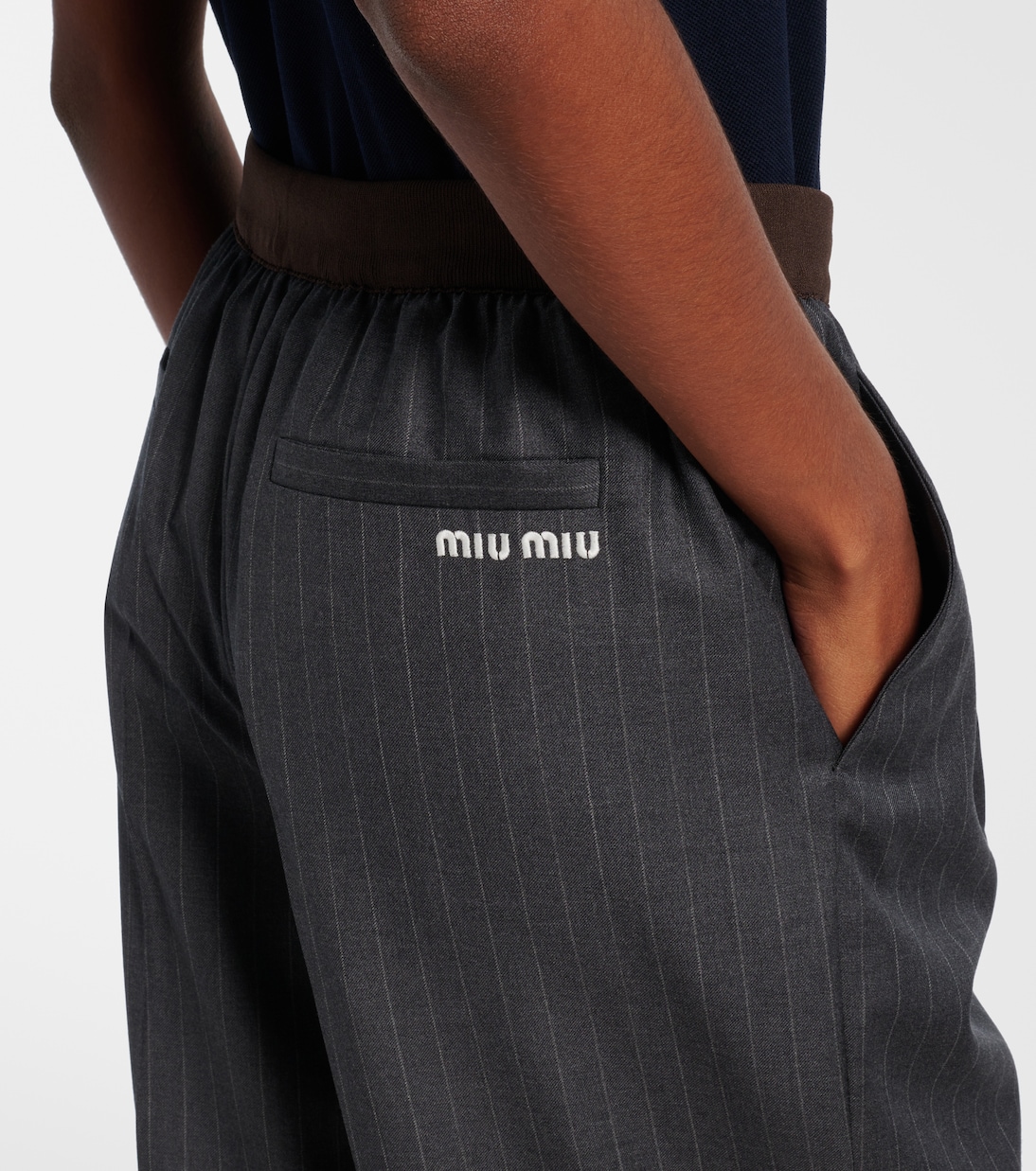 Pinstripe virgin wool wide-leg pants | Miu Miu