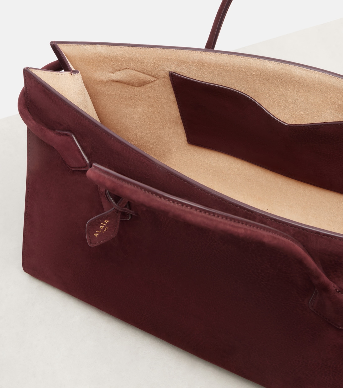 Le Teckel Large leather shoulder bag | Alaïa