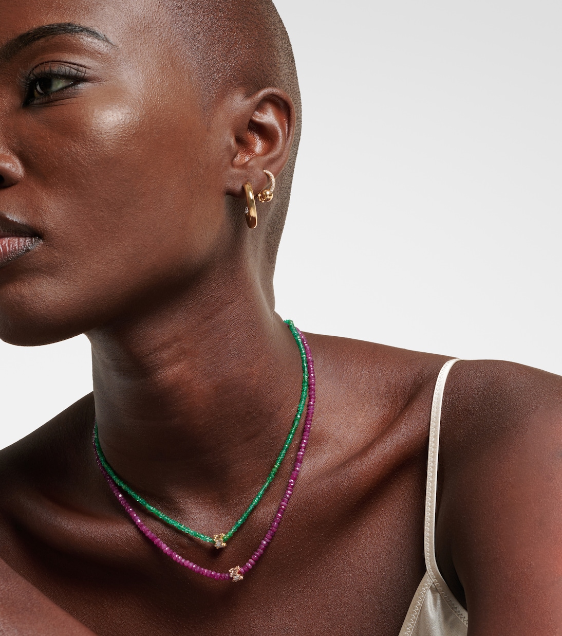 Infinite 18kt rose gold necklace with rubies and diamonds | Suzanne Kalan