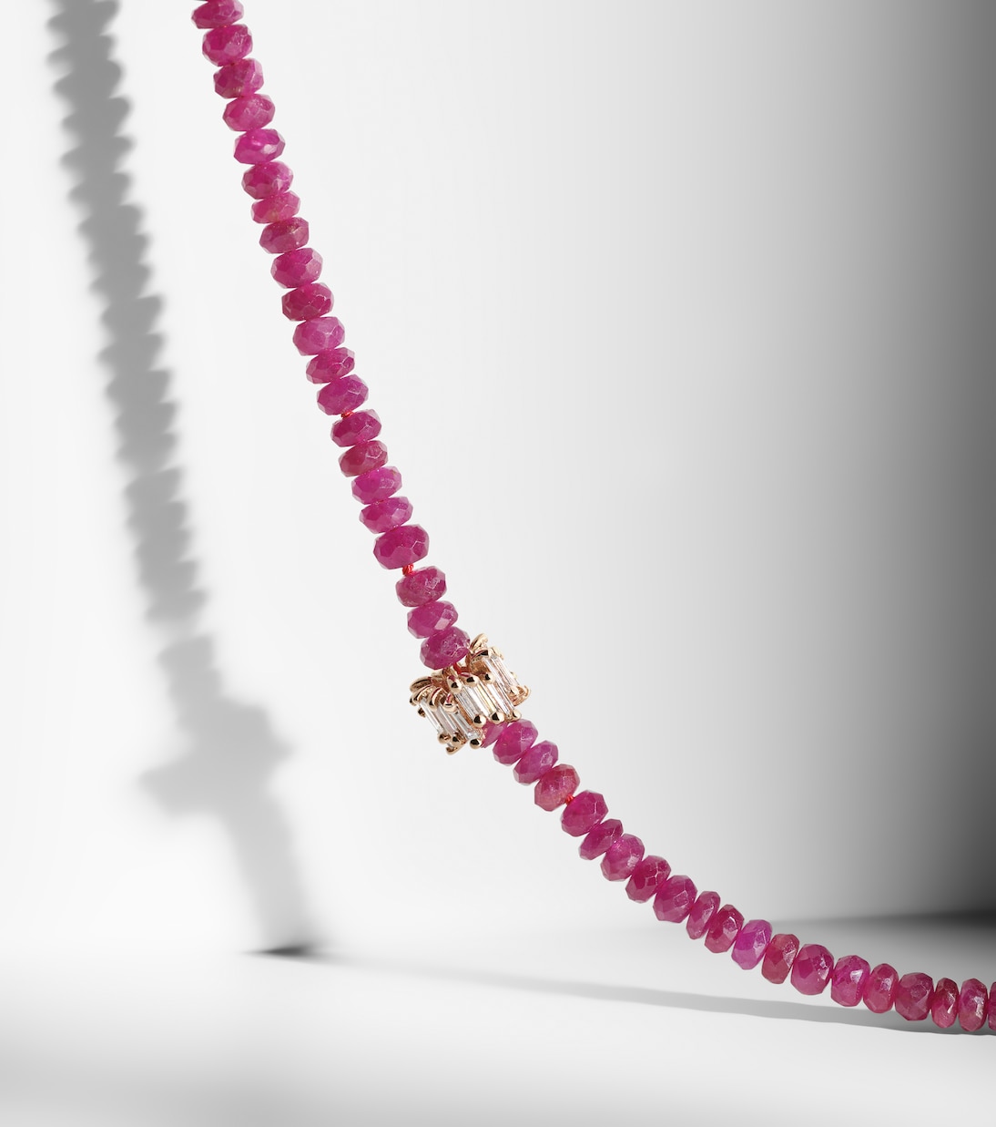 Infinite 18kt rose gold necklace with rubies and diamonds | Suzanne Kalan