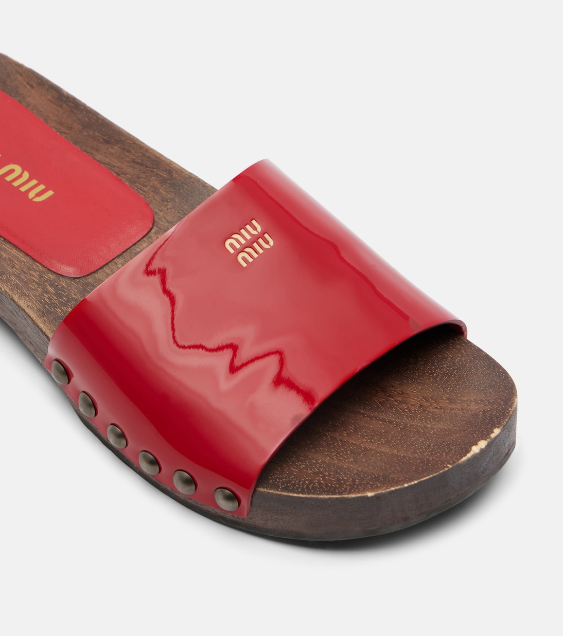 Pantoletten aus Lackleder | Miu Miu