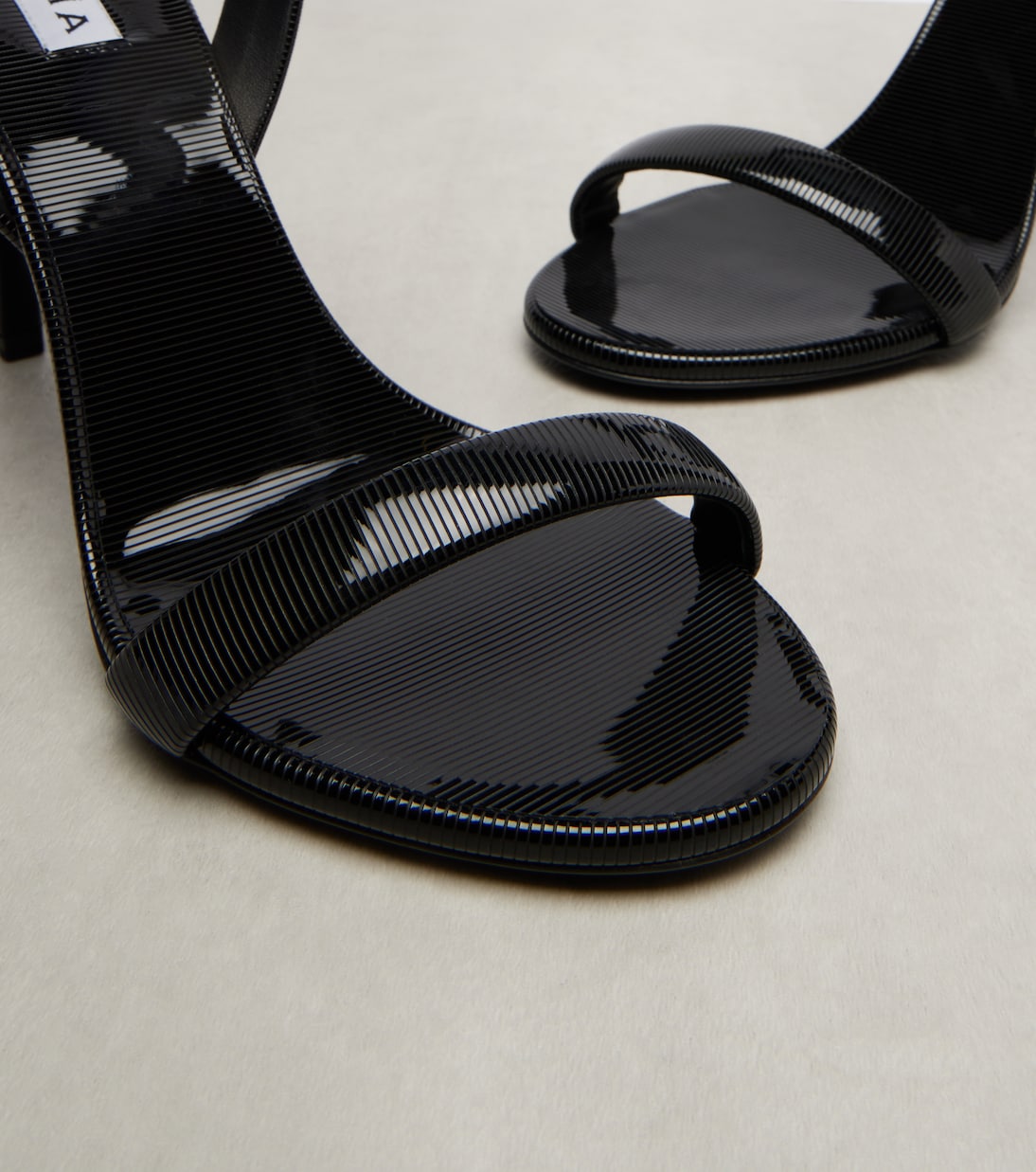 Chain trompe l'œil patent leather sandals | Alaïa