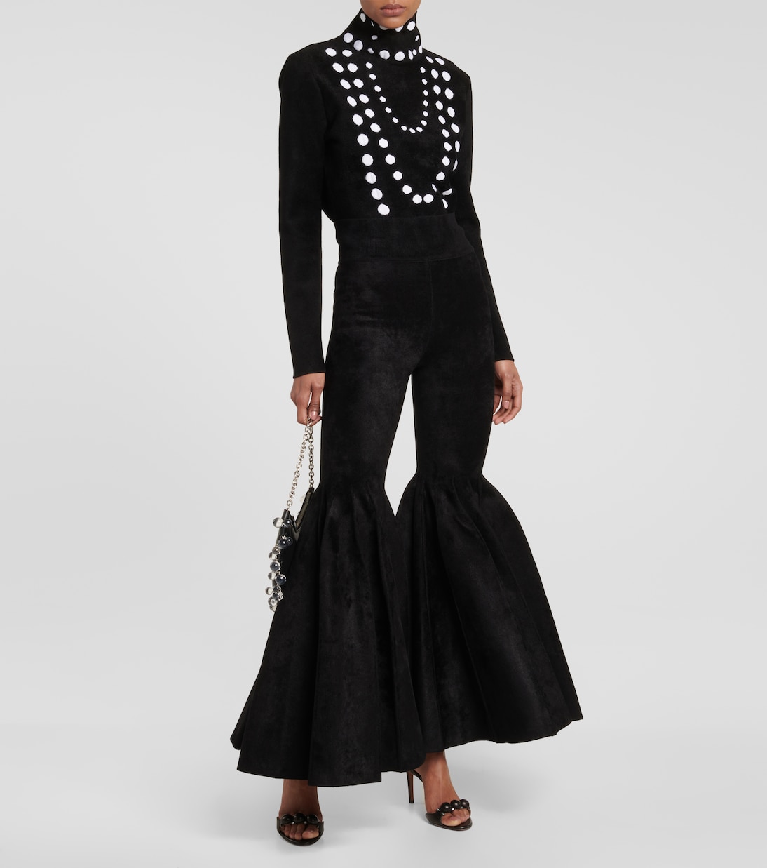 Pantaloni flared in velluto | Alaïa
