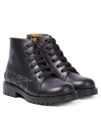 Logo embossed leather boots | Gucci Kids