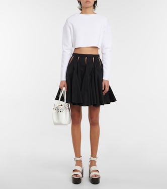 Minigonna in cotone con cut-out | Alaïa