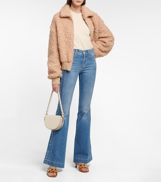 Jeans flared a vita media con logo | Stella McCartney
