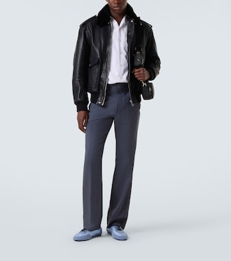 Faux fur-trimmed leather jacket | Prada