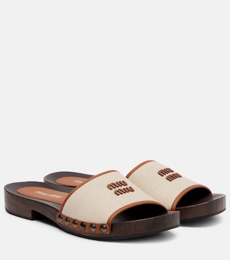 Mules in canvas con logo | Miu Miu
