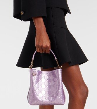 GG Emblem Medium metallic leather bucket bag | Gucci