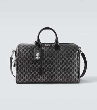 GG leather-trimmed duffel bag | Gucci