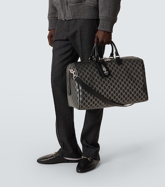 GG leather-trimmed duffel bag | Gucci
