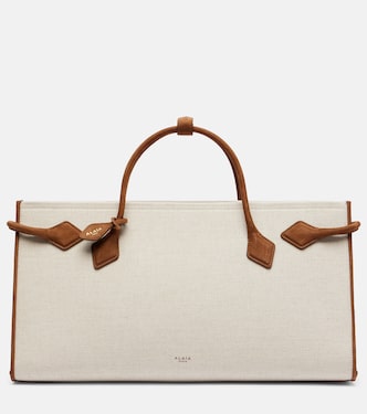 Le Teckel leather-trimmed canvas tote bag | Alaïa