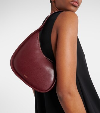 Half Moon leather shoulder bag in burgundy The Row Mytheresa