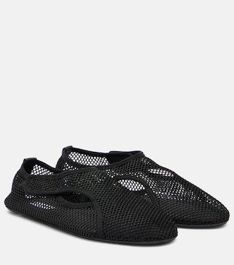 Fishnet slip-on shoes | Alaïa