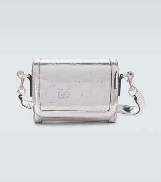 GG Mini embossed shoulder bag | Gucci