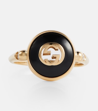 Ring Interlocking G aus 18kt Gelbgold mit Diamanten und Onyx | Gucci