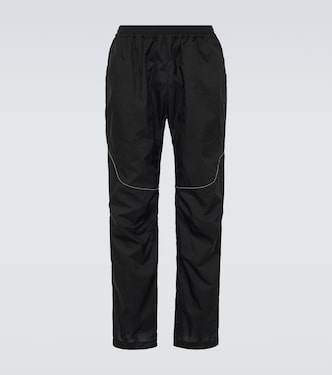 Pantalones rectos de nylon ripstop | And Wander