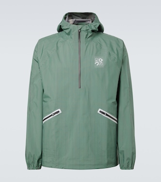 x On striped technical jacket  | Loewe