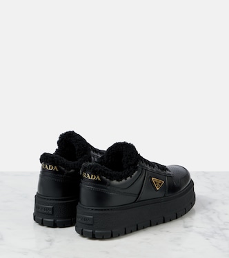 Shearling-lined leather platform sneakers | Prada