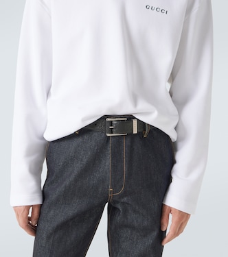 GG debossed leather belt | Gucci