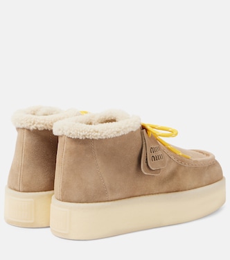 Shearling-lined leather platform ankle boots | Miu Miu