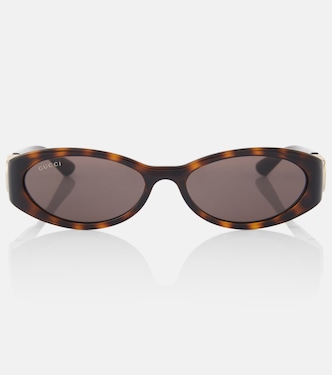 Occhiali da sole Interlocking G ovali | Gucci