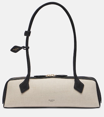 Le Teckel Small suede-trimmed shoulder bag | Alaïa