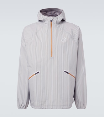 x On striped technical jacket  | Loewe