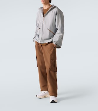 x On striped technical jacket  | Loewe