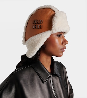 Shearling-trimmed leather hat | Miu Miu