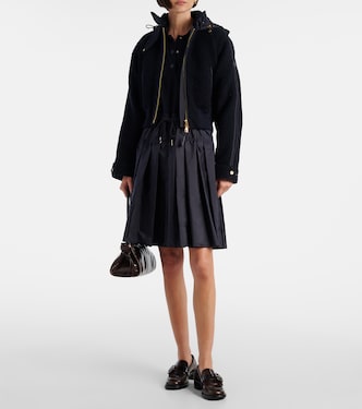 Piumino in lana vergine con cappuccio  | Moncler