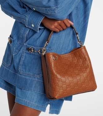 GG Emblem Small leather bucket bag | Gucci
