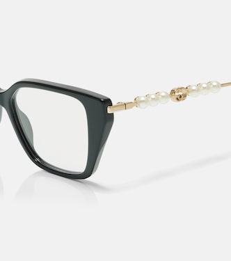 Occhiali cat-eye con logo Interlocking G | Gucci
