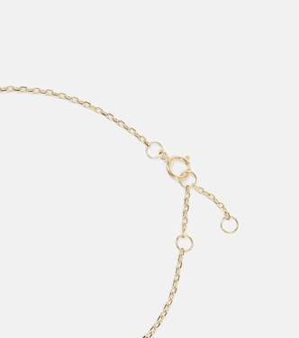 Tiny Emerald Goddess 14kt gold bracelet with emerald and diamonds | Stone and Strand