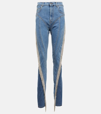 Spiral tassel-trimmed skinny jeans | Mugler
