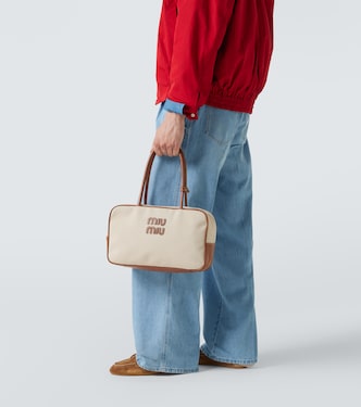 Logo leather-trimmed canvas tote bag | Miu Miu