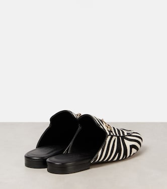 Mules in cavallino con stampa zebrata | Gucci