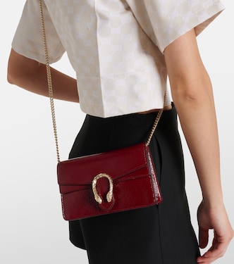 Dionysus Super Mini patent leather shoulder bag in red Gucci Mytheresa