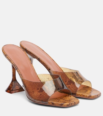 Lupita snake-print PVC mules | Amina Muaddi