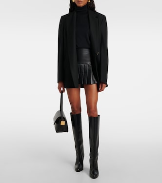 Pleated faux leather miniskirt | Norma Kamali